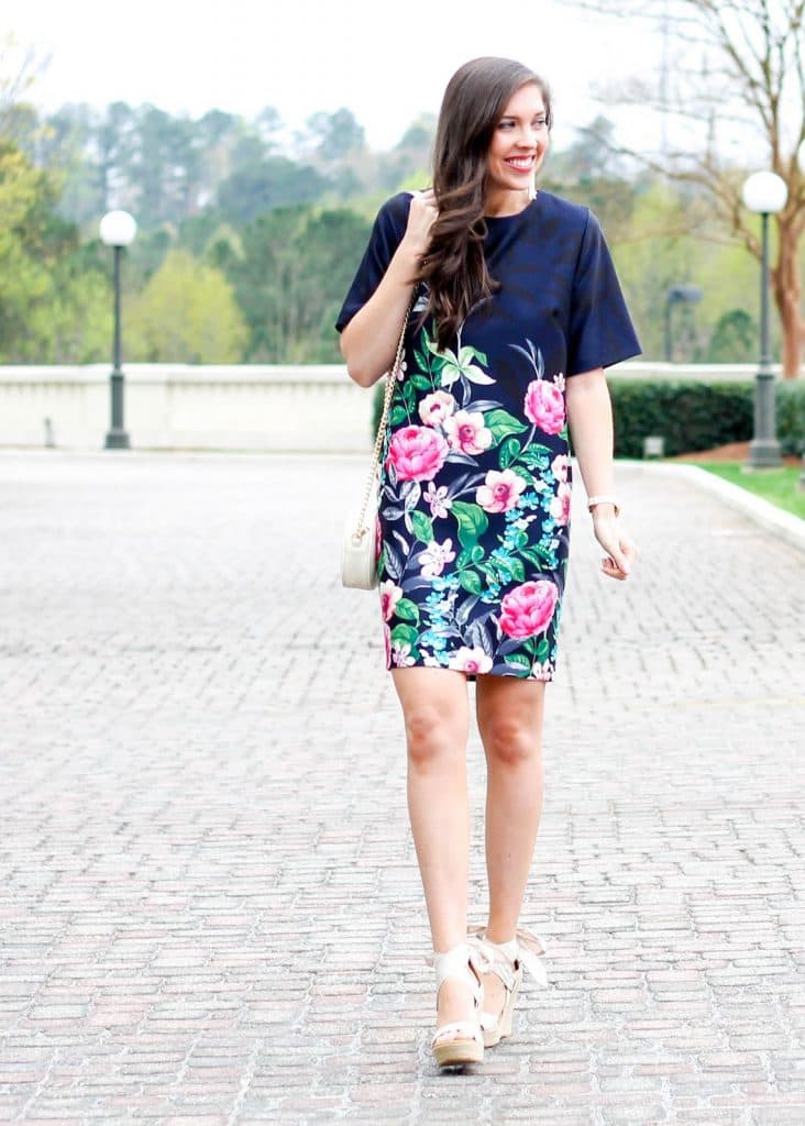 Summer Work Outfit Idea: A Floral Skirt, a White T-Shirt, and Wedges