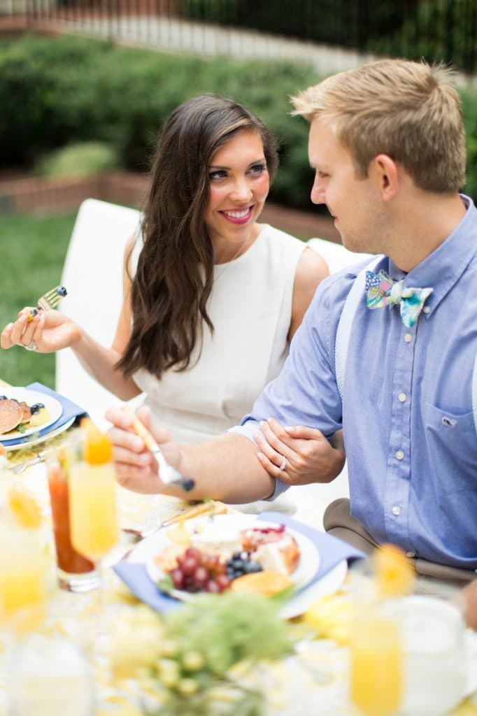Wedding brunch ideas, brunch decor, the carolina inn, whiskey and white events, blue barn photography, pretty in the pines, north carolina blog, vineyard vines, high cotton bowtie, pastel bowtie, bloody mary engagement party, bridal brunch, white romper, ASOS, groom suspenders, outfit, styled shoot