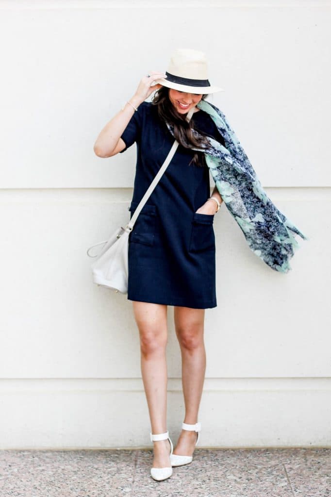 Fedora, Navy blue dress, fringed dress, fringed shift dress, LOFT fringed shift dress, washed floral scarf, patterned scarf for spring, cute spring outfit idea, poverty flats by rian bucket bag, sam edelman pointy toe pumps ankle strap, pretty in the pines, fashion blogger, north carolina blogger, fossil watch
